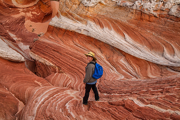 Sheryl Descending Into the Wormhole, White Pocket, Vermilion Cliffs National Monument, AZ (2014)