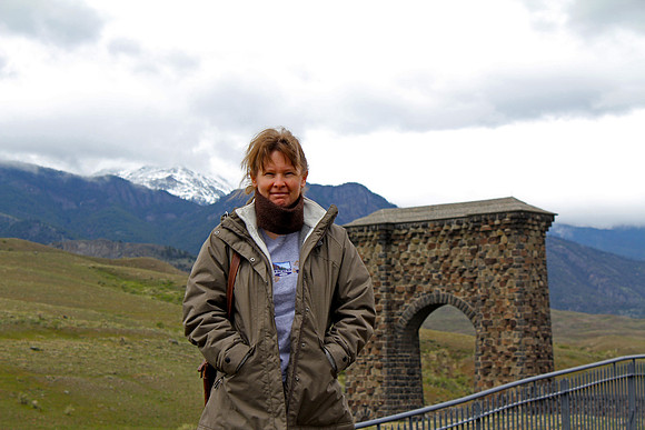 Sheryl at Roosevelt Arch, North Entrance, Yellowstone National Park, WY (2013)
