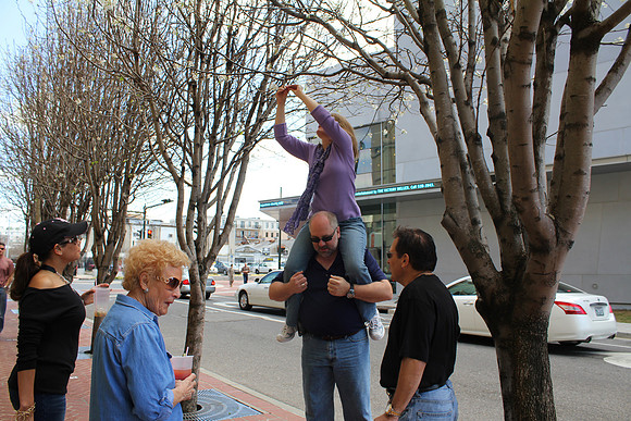 Sheryl Hangs an Ornament, World War II Museum, New Orleans, LA (2011)