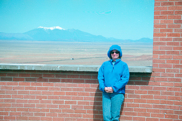 Sheryl at Meteor Crater, Overlooking San Francisco Peaks, Winslow, AZ (2003)
